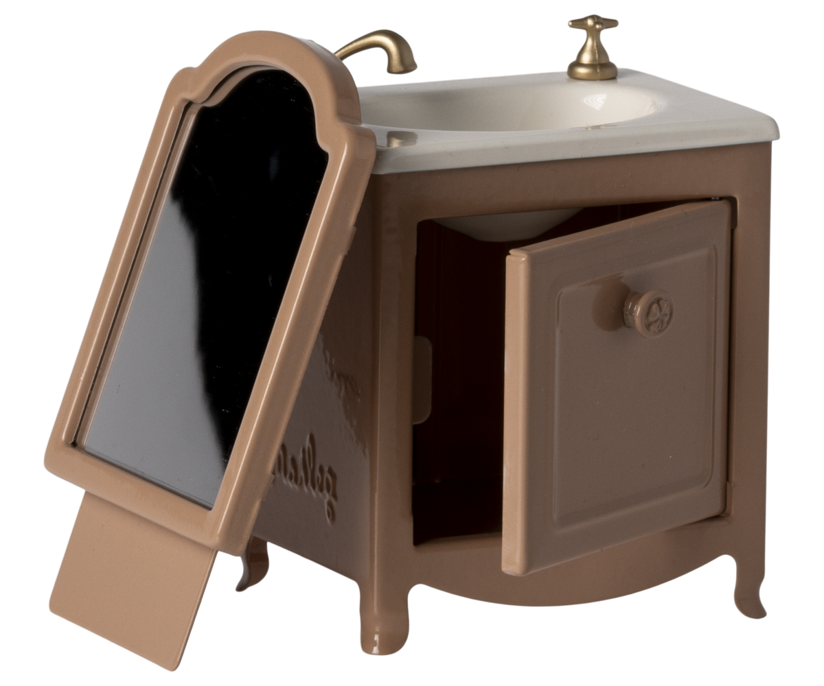 Lavabo con espejo, Ratón