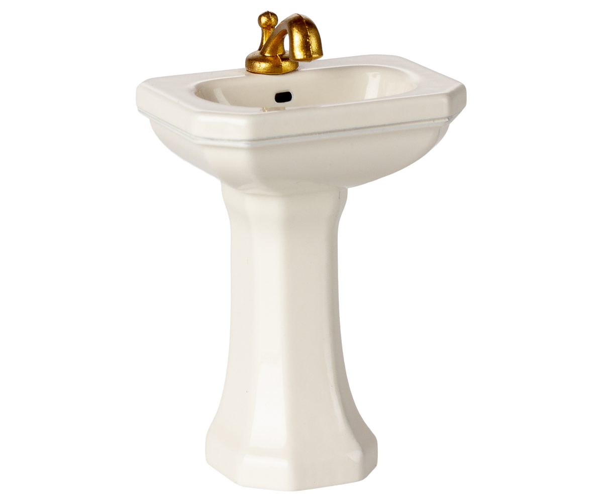 Lavabo de baño, ratón