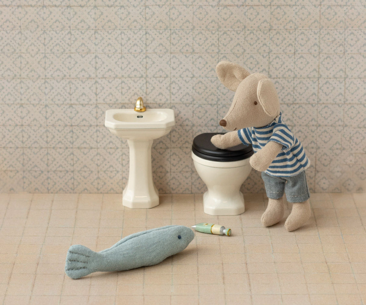 Lavabo de baño, ratón
